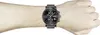 A man's arm wearing a Hugo Boss watch. Voir les images du produit