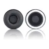 Two black ear pads for headphones are shown against a white background. Produktbild-Vorschau