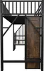 A close-up view of a black metal loft bed with wooden accents, showing the stairs and a cabinet. Podgląd zdjęcia produktu