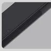 A close-up view of a black phone case with a textured surface and ribbed grip areas. Produktbild-Vorschau
