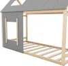 A close-up view of a wooden children's bed frame with a house-shaped roof and a window cutout. Podgląd zdjęcia produktu