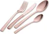 A set of rose gold cutlery, including a fork, knife, and two spoons, is arranged diagonally on a white background. Podgląd zdjęcia produktu