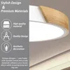 A close-up of a modern ceiling light with a white body and a wooden accent, with marketing text and icons on the left side. Voir les images du produit