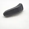 The back of a black electric shaver is shown on a white background. Voir les images du produit