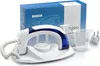 A white and blue travel iron set on a white surface, with its packaging and accessories in the background and foreground. Podgląd zdjęcia produktu