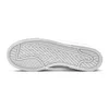 The sole of a white NIKE sneaker is shown against a white background. Náhled obrázku produktu
