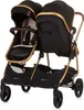A studio shot of a black and gold double stroller. Produktbild-Vorschau