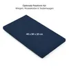 A dark blue mattress or pad is shown at an angle on a white background. Voir les images du produit