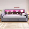 A modern daybed with integrated shelving and LED lighting. Voir les images du produit