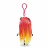 The back of a small doll with long, ombre hair and a pink clip attached to its head. Produktbild-Vorschau