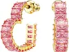 A pair of gold hoop earrings with pink baguette-cut stones. Produktbild-Vorschau