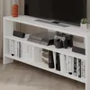 A white media console with a TV, gaming console, controllers, speakers, and books. Produktbild-Vorschau