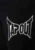 A close-up of the Tapout logo on a black garment. Produktbild-Vorschau