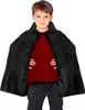 A young boy wearing a black cape and a red shirt, standing against a white background. Produktbild-Vorschau