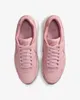 A top-down view of a pair of pink Nike Air Max Command Premium sneakers against a white background. Voir les images du produit
