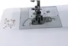 Close-up view of the needle and presser foot area of a sewing machine, with instructional diagrams on the left. Produktbild-Vorschau