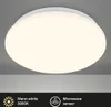 A white LED ceiling light with a warm white glow, mounted on a gray ceiling. Produktbild-Vorschau