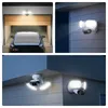 Collage of images showing a floodlight security camera installed in different outdoor settings, including a garage and a house exterior at night. Produktbild-Vorschau