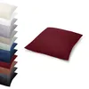 A stack of pillowcases in various colors and a single burgundy pillowcase. Produktbild-Vorschau