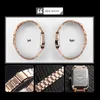 Collage of images showing a rose gold watch from different angles and close-ups of its band and back. Produktbild-Vorschau