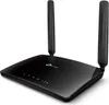 A black TP-Link Archer MR200 dualband 4G LTE WLAN router with two antennas is shown on a white background. Podgląd zdjęcia produktu