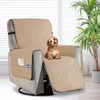 A dog is sitting on a beige recliner chair cover with side pockets, in a well-lit room with a plant and blinds. Anteprima dell’immagine prodotto