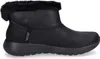 A black Skechers boot with faux fur trim. Voir les images du produit
