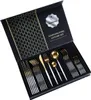 A cutlery set in an open black box. Voir les images du produit