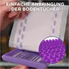 A hand is shown attaching a Swiffer floor wipe to a Swiffer mop head. Anteprima dell’immagine prodotto