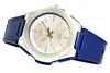 A close-up, angled view of a Casio watch with a silver case, a light pink dial, and a dark blue rubber strap, set against a white background. Voir les images du produit