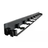 A black plastic edging strip with multiple holders for garden stakes or similar items, shown against a white background. Podgląd zdjęcia produktu
