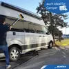 A person is washing a white camper van with a telescopic brush. Náhľad obrázku produktu