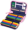 An open pencil case filled with colored pencils, a ruler, an eraser, and a sharpener. Náhled obrázku produktu