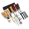 A collection of leathercraft tools laid out on a white background. Voir les images du produit