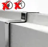 Close-up of stainless steel hooks attached to a metal edge, with 'no' symbols indicating improper use. Produktbild-Vorschau