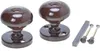Two brown doorknobs with their mounting hardware are displayed on a white background. Náhled obrázku produktu