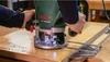 A person is using a Bosch router on a wooden surface. Anteprima dell’immagine prodotto