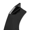 A close-up, studio shot of a glossy black automotive accessory, possibly a spoiler or diffuser extension, against a white background. Náhled obrázku produktu