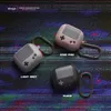 Three Elago AW5 silicone cases for AirPods 3, designed to look like retro gaming devices, are displayed against a glitchy, colorful background. Each case is shown in a different color: Sand Pink, Light Grey, and Black. Text labels indicate the color of eac Voir les images du produit