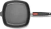 A top-down view of a square grill pan with a black handle and a red accent on the handle. Náhľad obrázku produktu
