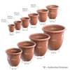 A collection of terracotta-colored plant pots of various sizes, with dimensions indicated by measurement lines and text. Produktbild-Vorschau