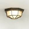 A ceiling light fixture mounted on a white ceiling. Produktbild-Vorschau