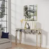 A mirrored console table with decorative vases and books displayed in a well-lit room with large windows. Produktbild-Vorschau