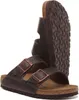 A pair of brown Birkenstock sandals shown from a slightly angled perspective against a white background. Produktbild-Vorschau
