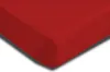 A close-up view of a red fitted sheet, showing the corner seam. Produktbild-Vorschau