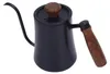 A black gooseneck kettle with a wooden handle and lid knob, shown on a white background. Podgląd zdjęcia produktu