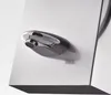 A close-up of a modern, sleek faucet mounted on a white surface. Podgląd zdjęcia produktu