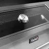A close-up view of a gas grill, focusing on the thermometer and the brand logo. Produktbild-Vorschau