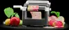 A vegetable slicer with various fruits and vegetables around it. Produktbild-Vorschau