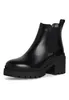 A black Chelsea boot with a thick sole is shown against a white background. Produktbild-Vorschau